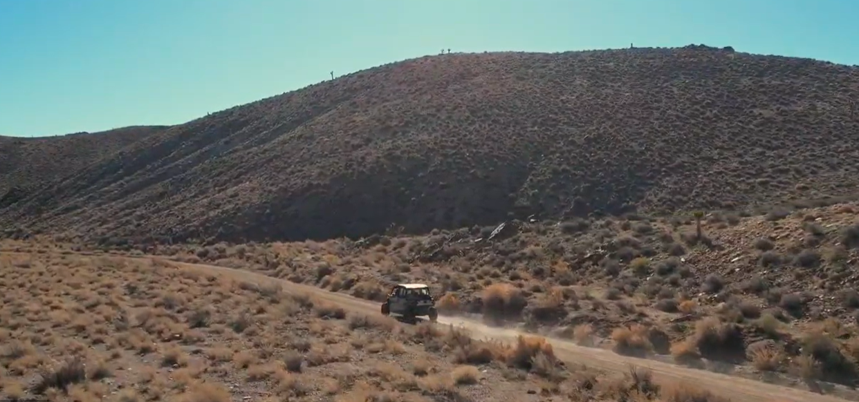 Side-by-side traveling a remote exploration road